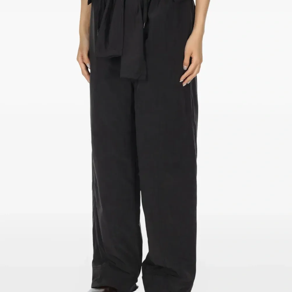 Брюки с оборками Брюки с оборками