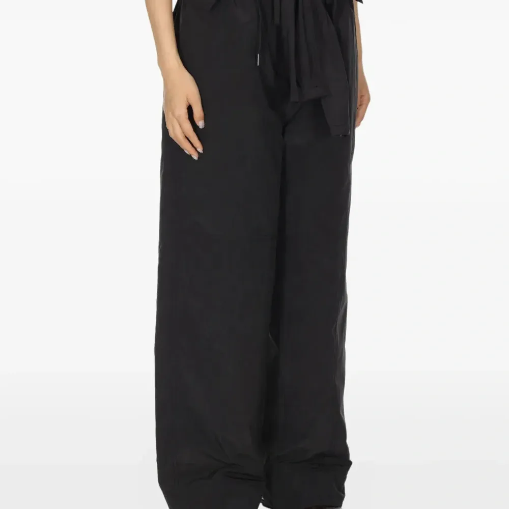 Брюки с оборками Брюки с оборками