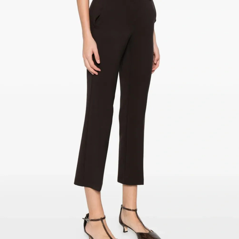 Брюки на пуговицах