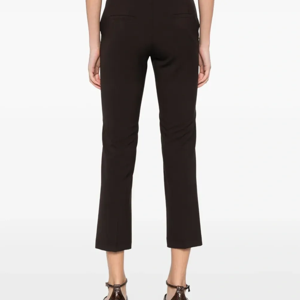 Брюки на пуговицах