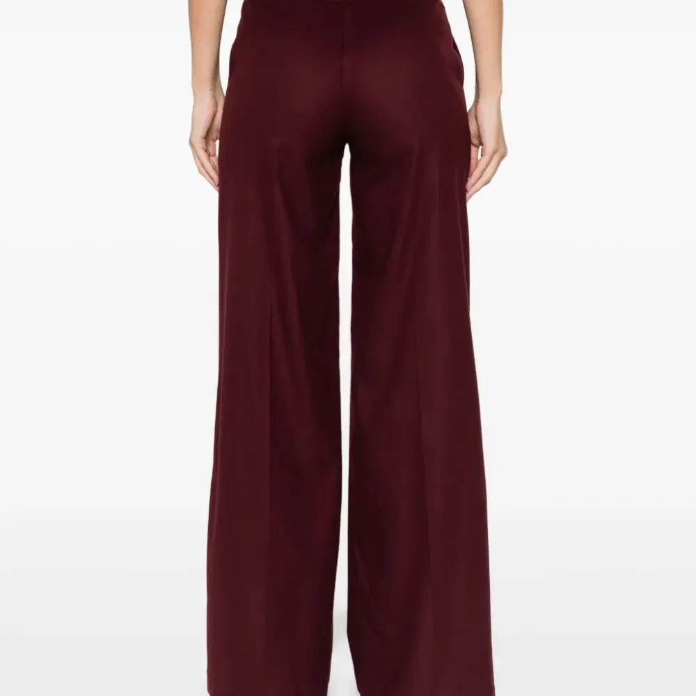 Брюки с ремешками