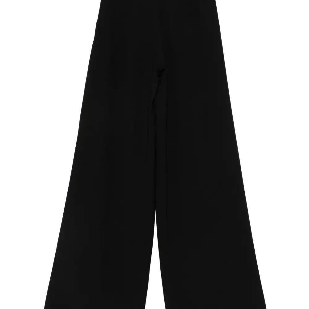 Плиссированные брюки Плиссированные брюки