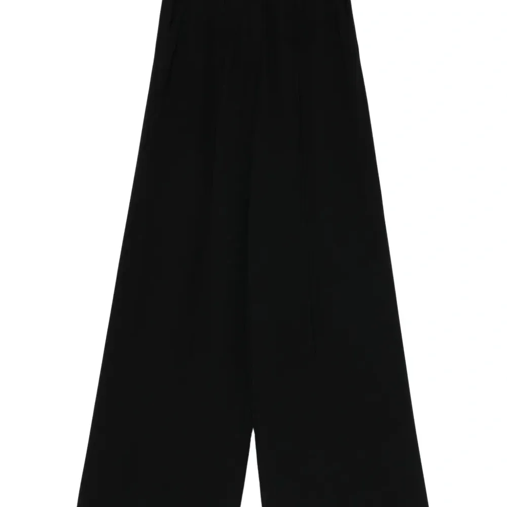 Плиссированные брюки Плиссированные брюки