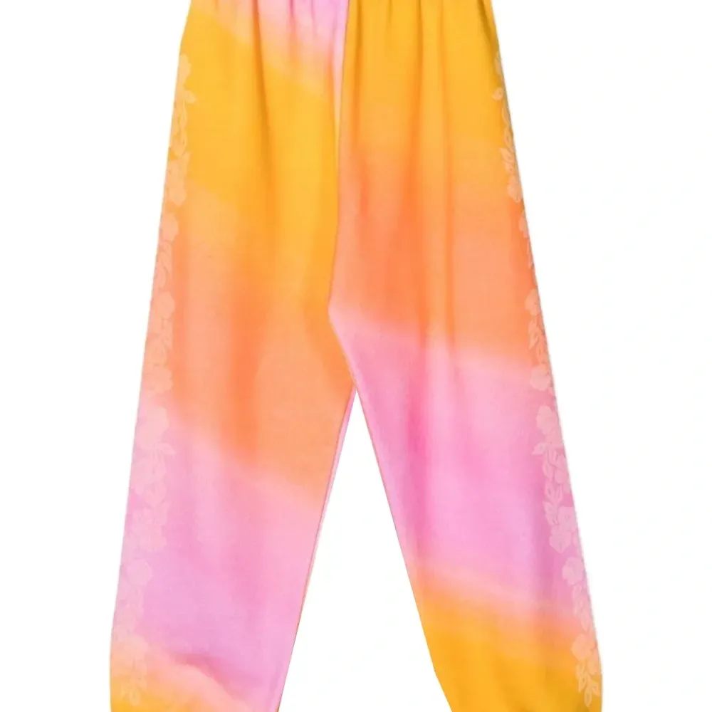 Брюки с цветочным принтом Брюки с цветочным принтом