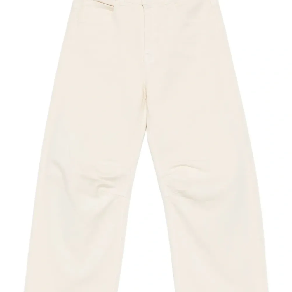 Джинсы с узором зигзаг