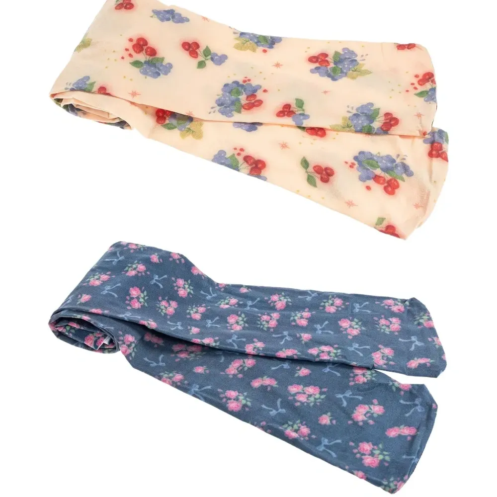 Комплект из двух колготок с цветочным узором Комплект из двух колготок с цветочным узором