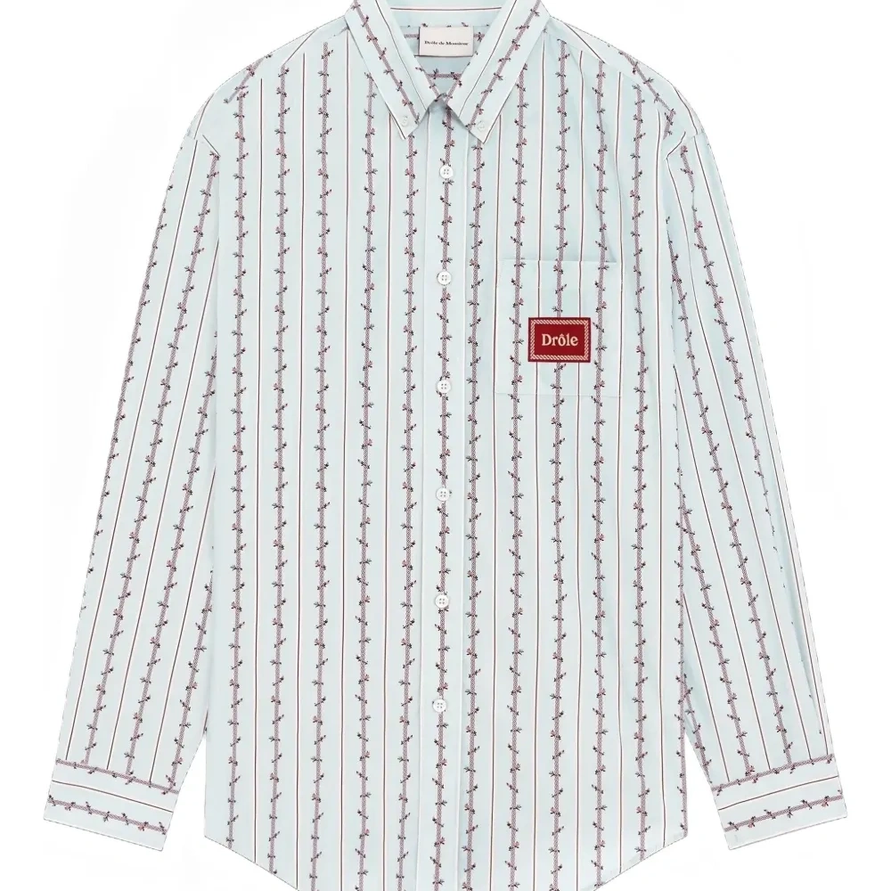 Полосатая рубашка с нашивкой