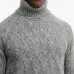 Свитер фактурной вязки с высоким воротником