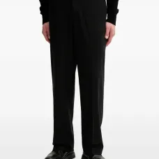 Брюки с деталями в виде складок Брюки с деталями в виде складок