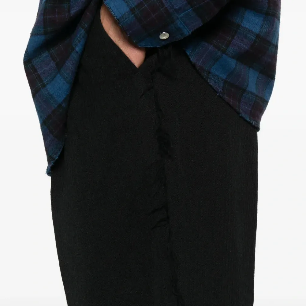 Брюки с бахромой