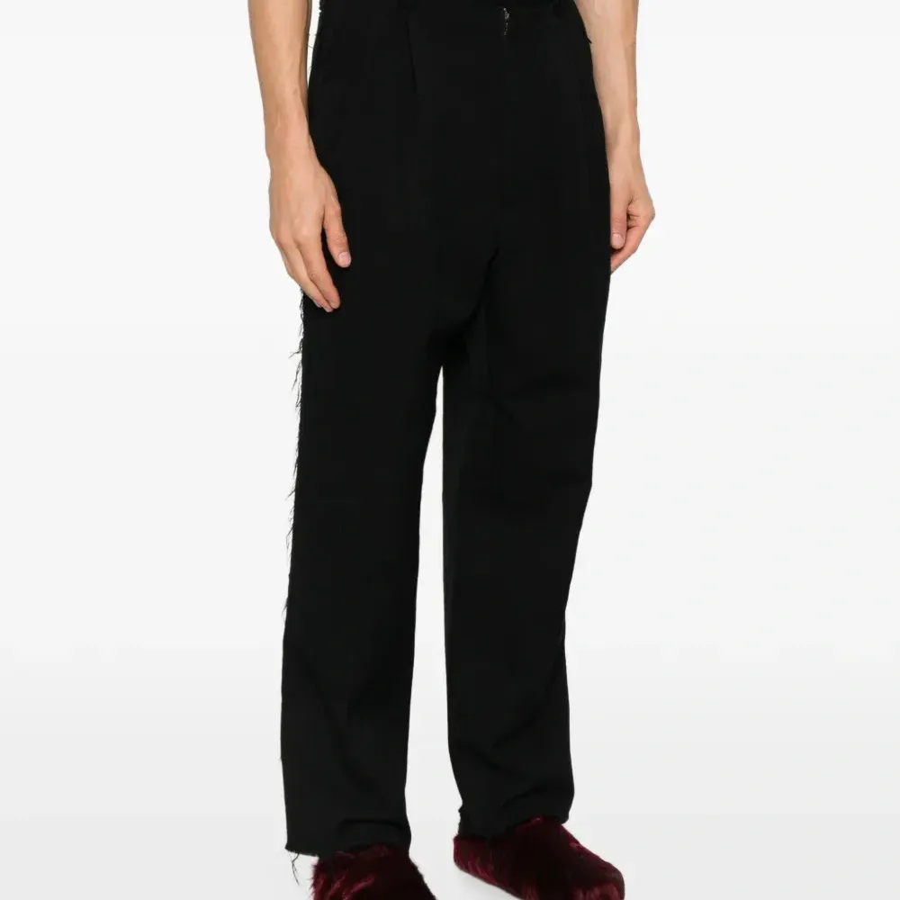 Брюки с бахромой