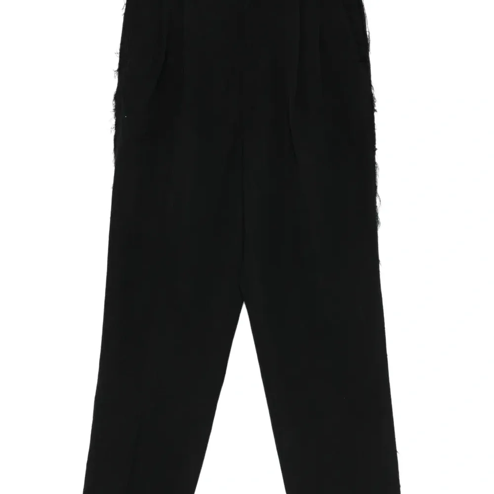 Брюки с бахромой