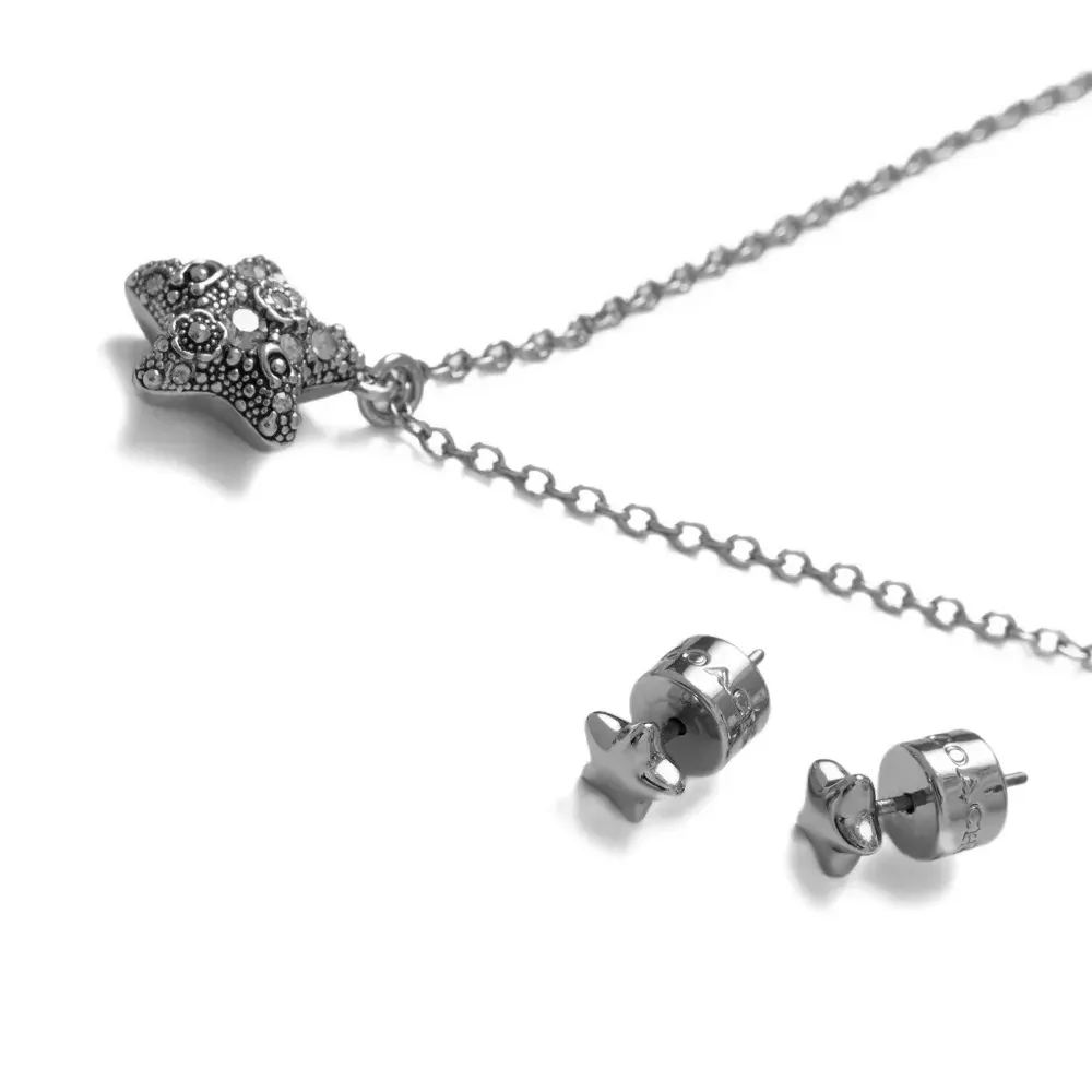 Набор с ожерельем и серьгами с подвесками в форме звёзд