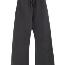 Трикотажные расклешённые брюки на завязке