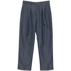 Брюки свободного кроя со складками