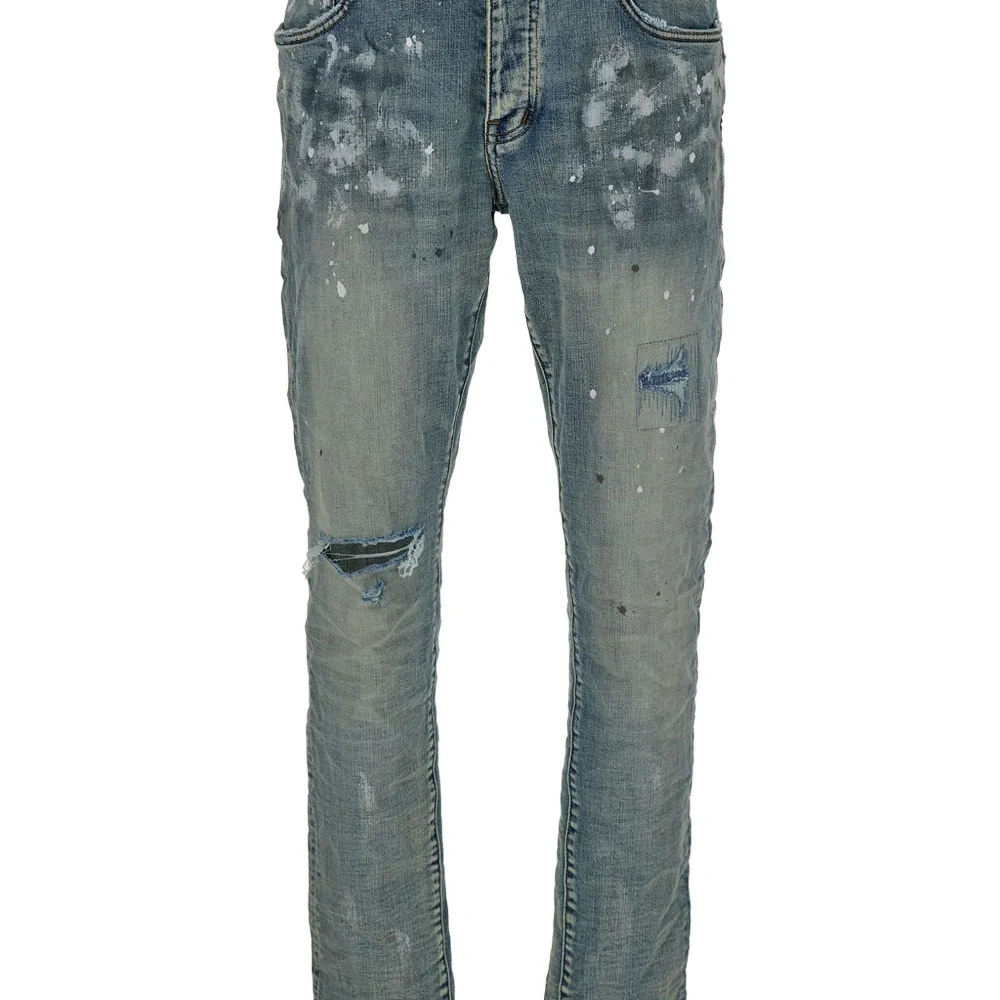 Джинсы с эффектом потертости