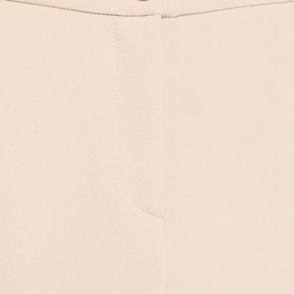 Брюки с разрезами на пуговицах