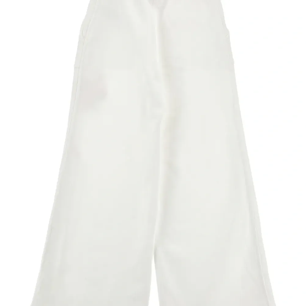 Брюки с цветочной вышивкой