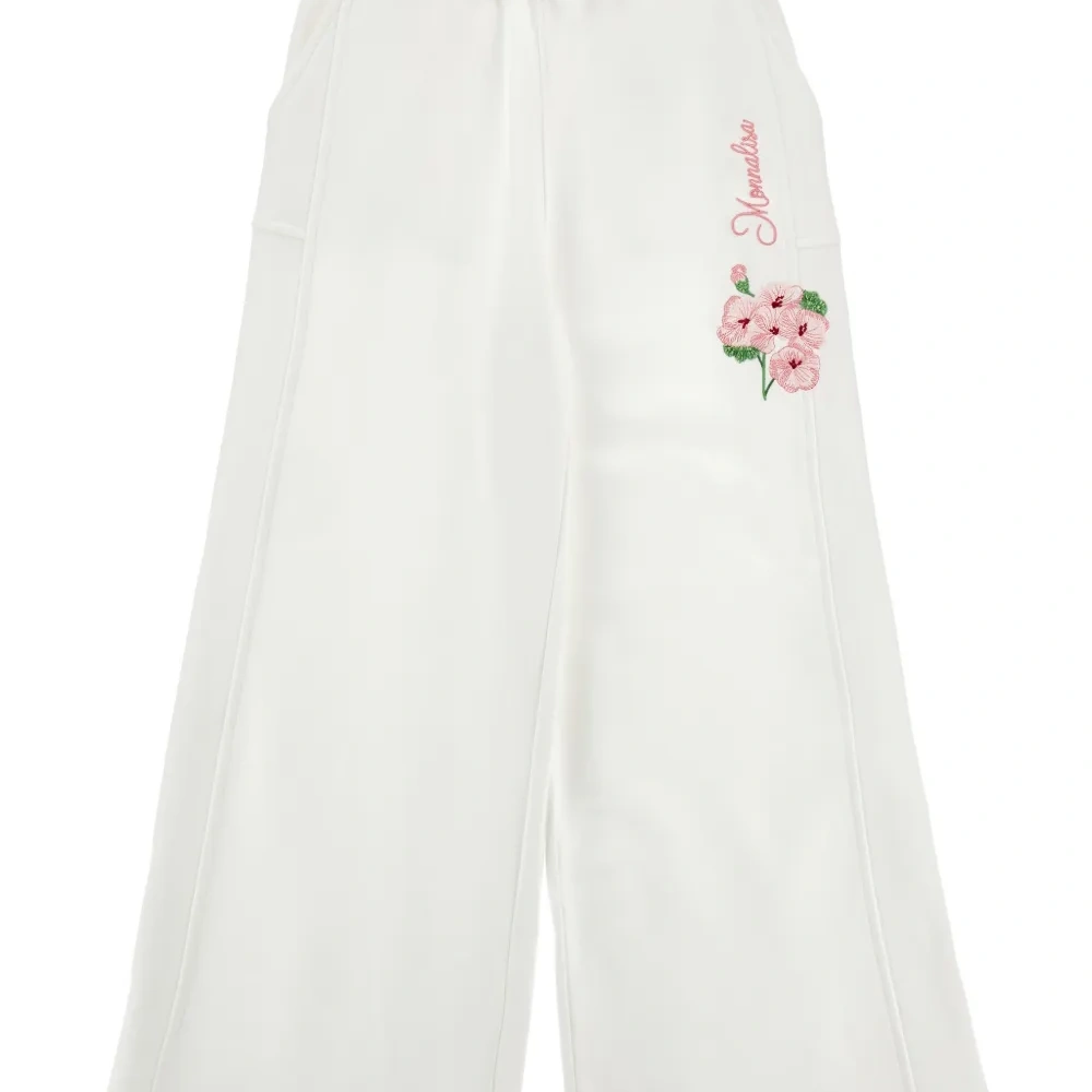 Брюки с цветочной вышивкой