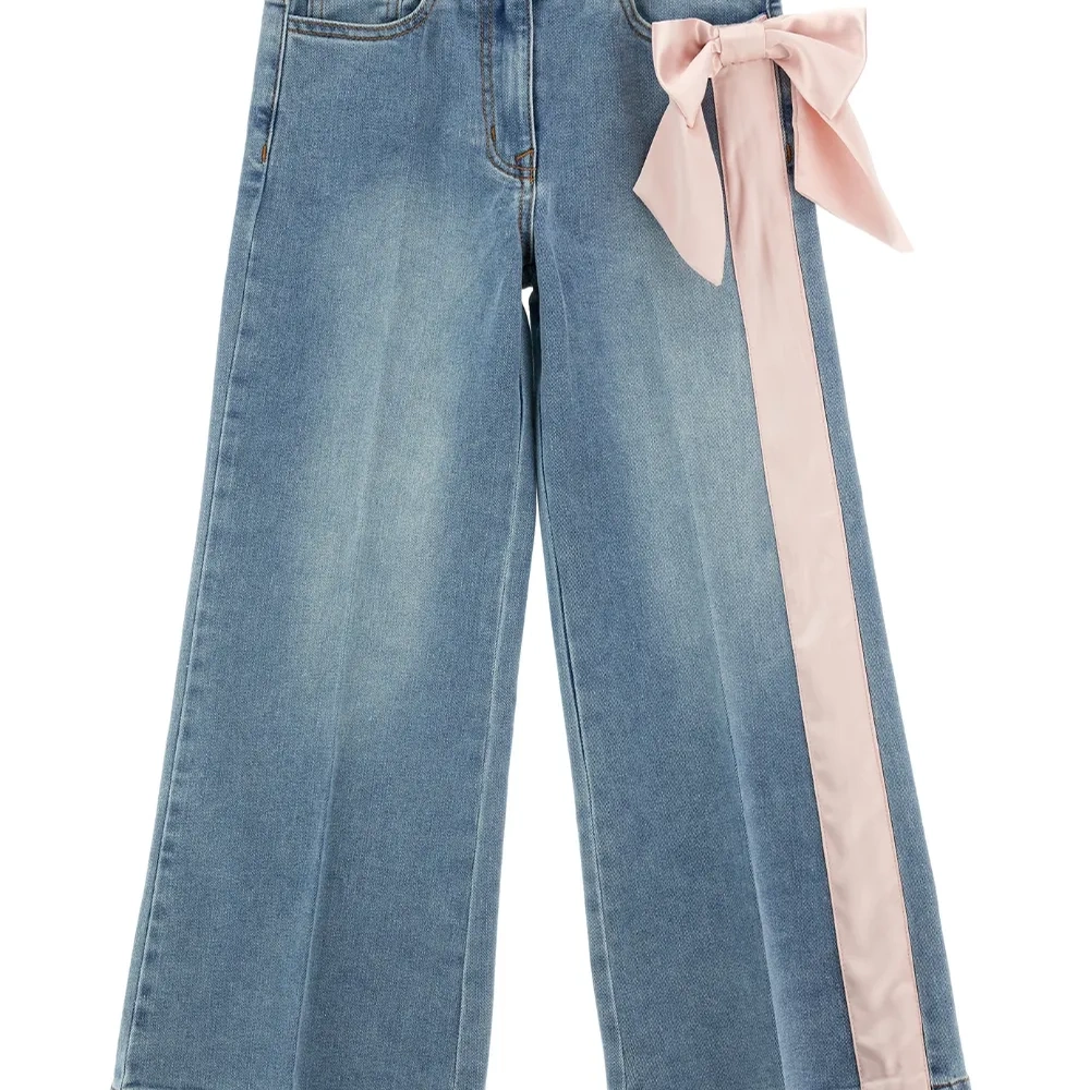 Джинсы с бантом