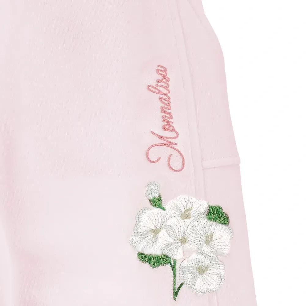 Брюки с цветочной вышивкой