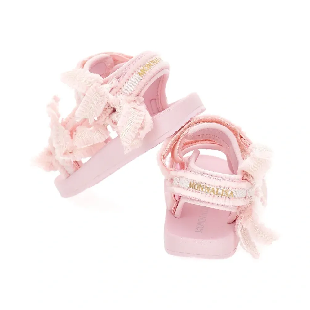 Босоножки с бантами и бахромой Босоножки с бантами и бахромой