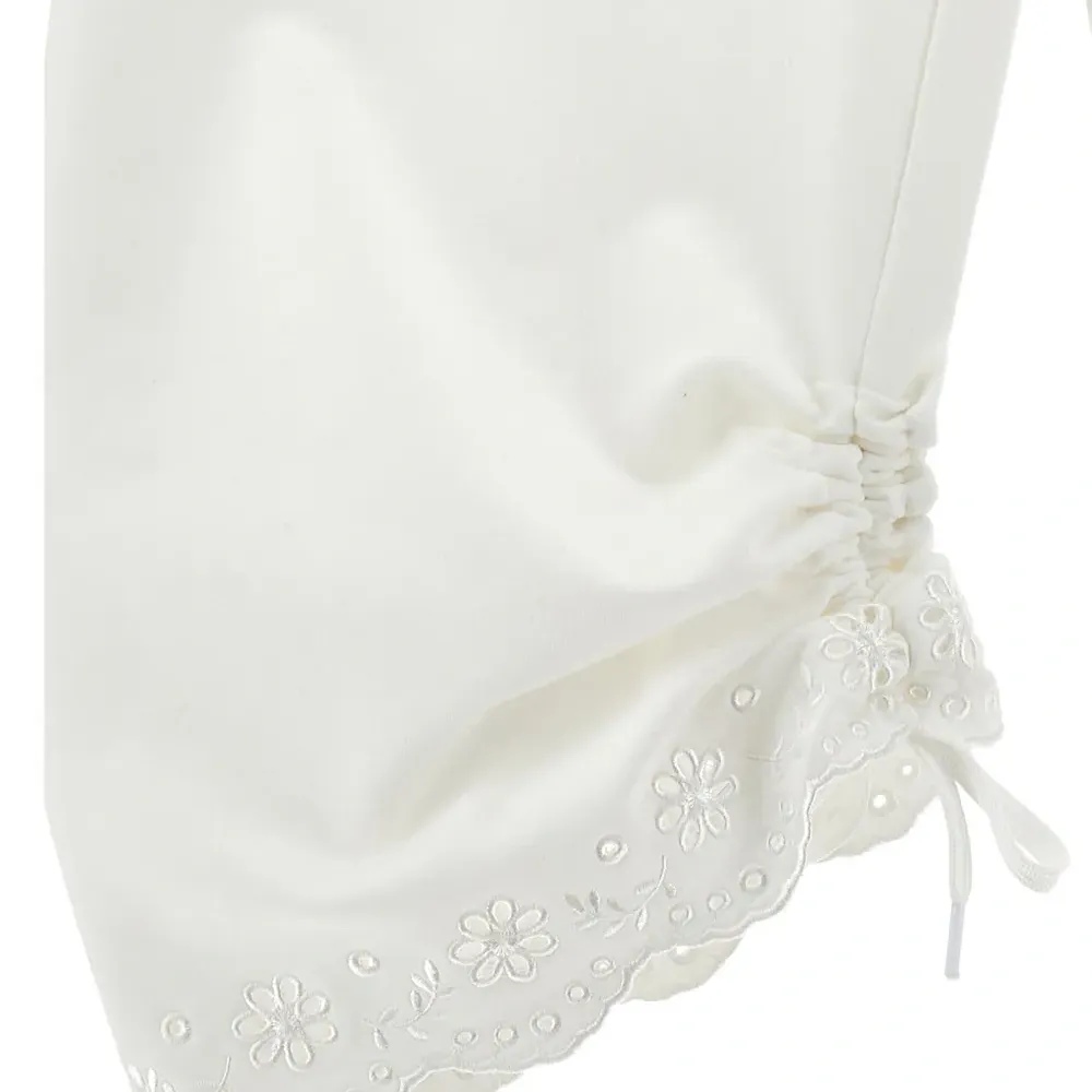 Брюки с кулиской и цветочной вышивкой