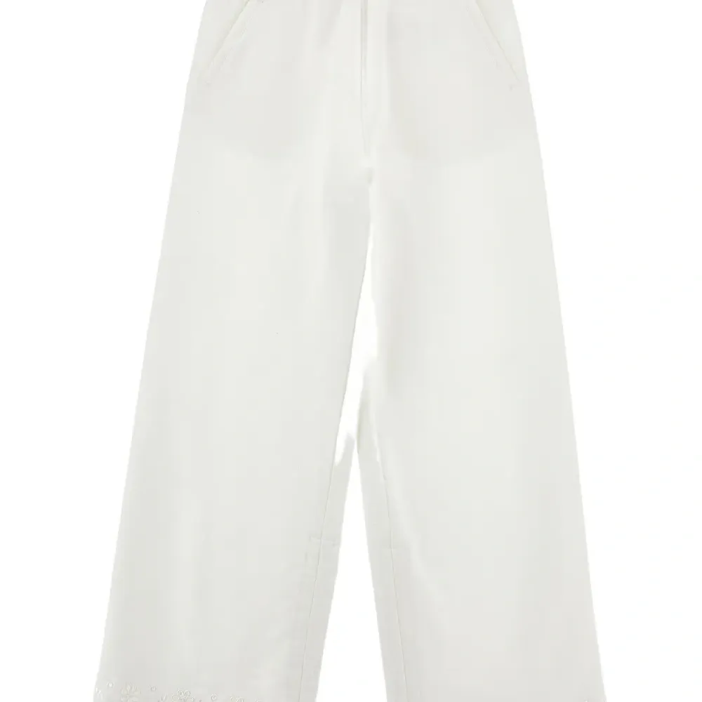 Брюки с кулиской и цветочной вышивкой