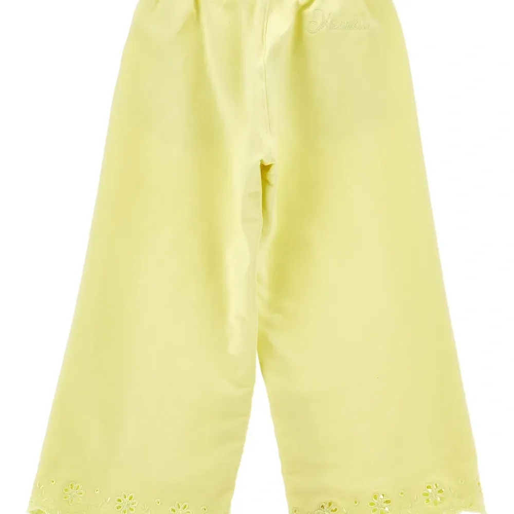 Брюки с люверсами