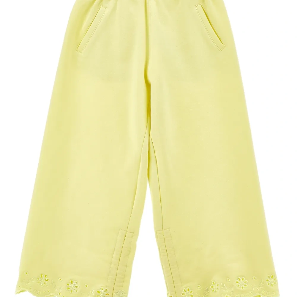 Брюки с люверсами