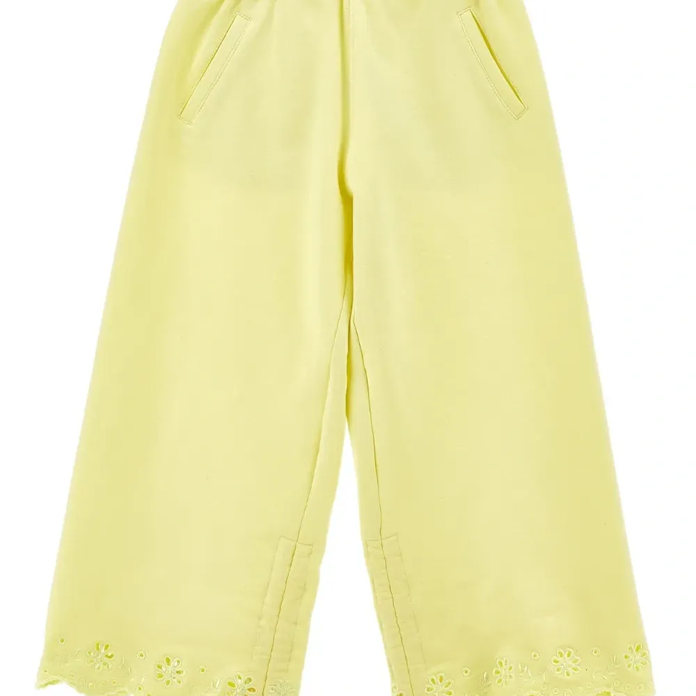 Брюки с люверсами