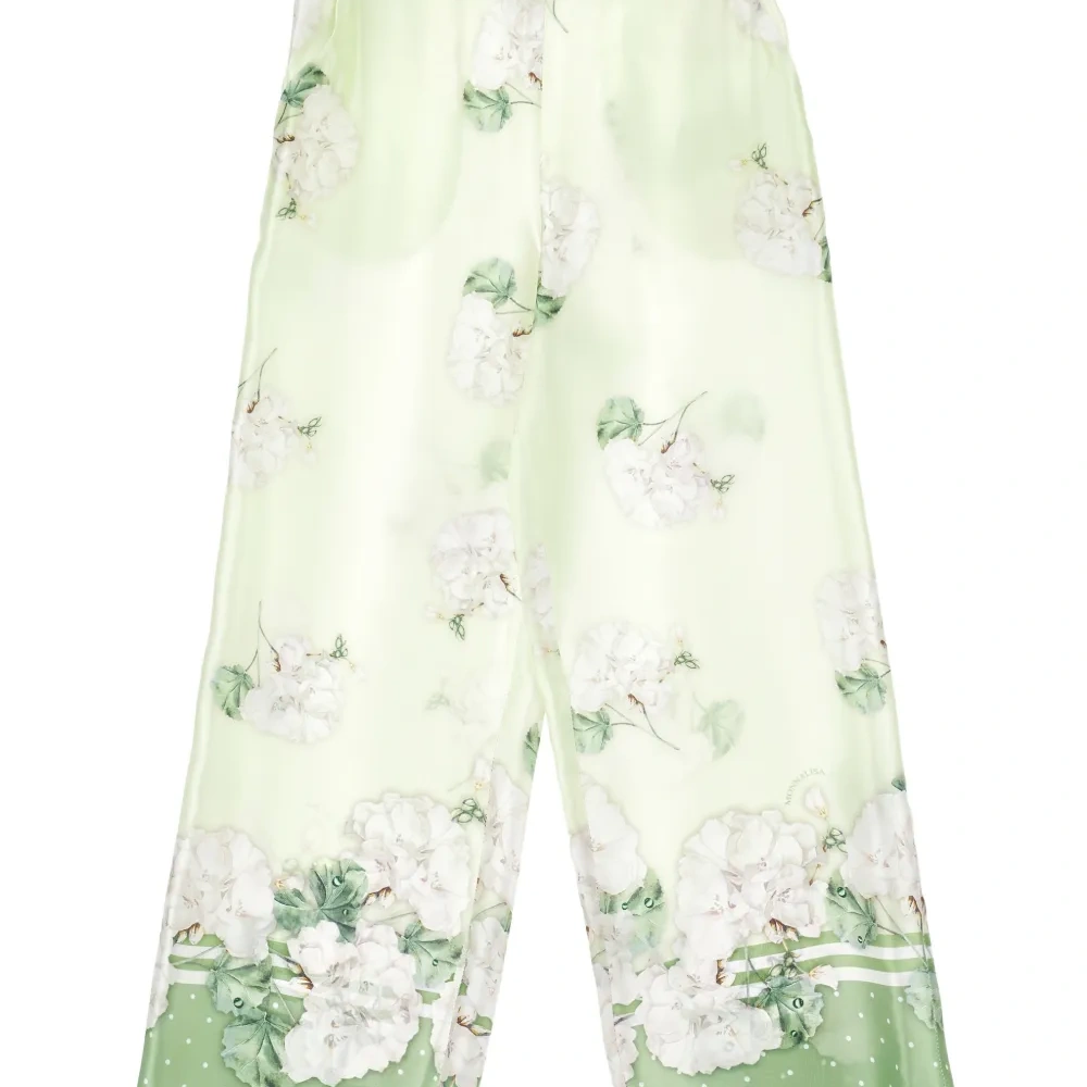 Брюки в горох с цветочным узором