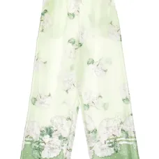 Брюки в горох с цветочным узором
