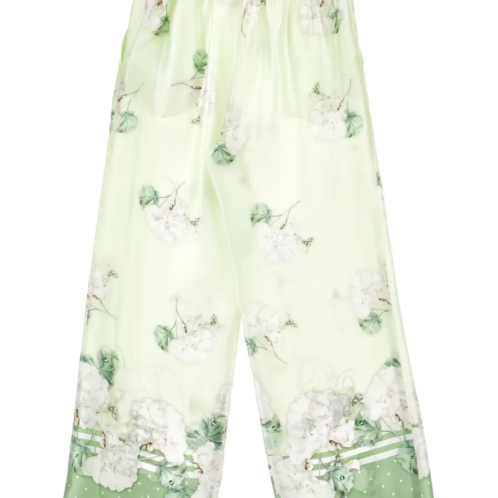 Брюки в горох с цветочным узором