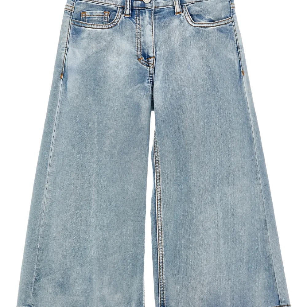 Джинсы с бантами