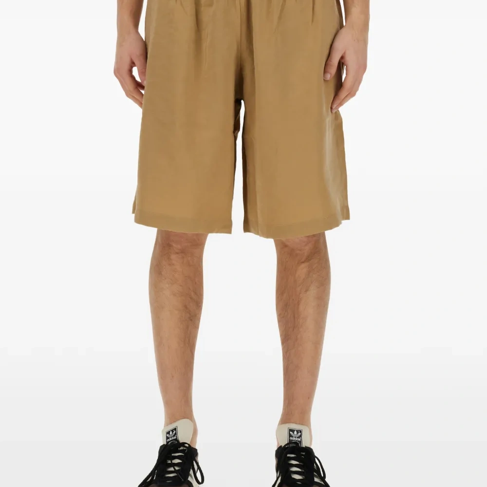 Шорты с логотипом и эластичным поясом Шорты с логотипом и эластичным поясом