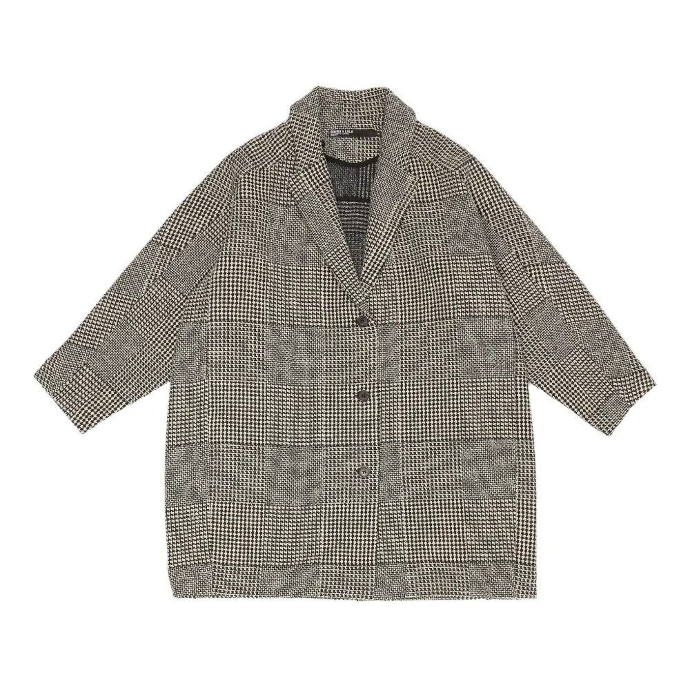 Жакет в ломаную клетку