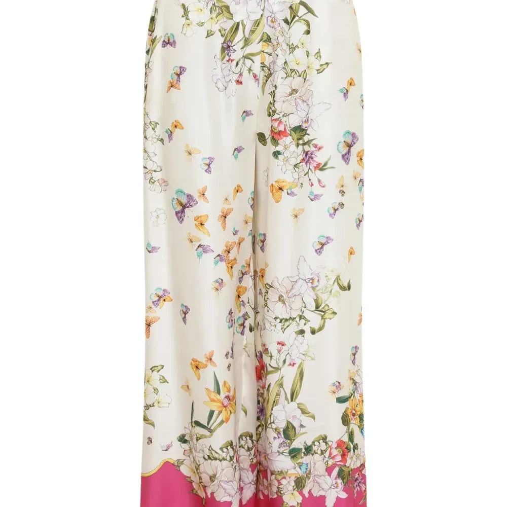 Брюки с цветочным принтом Брюки с цветочным принтом