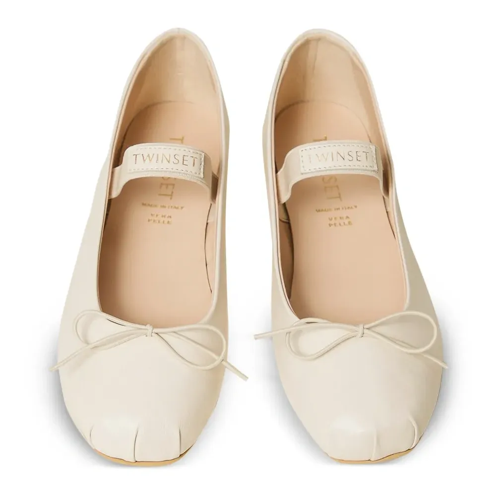 Балетки на плоской подошве