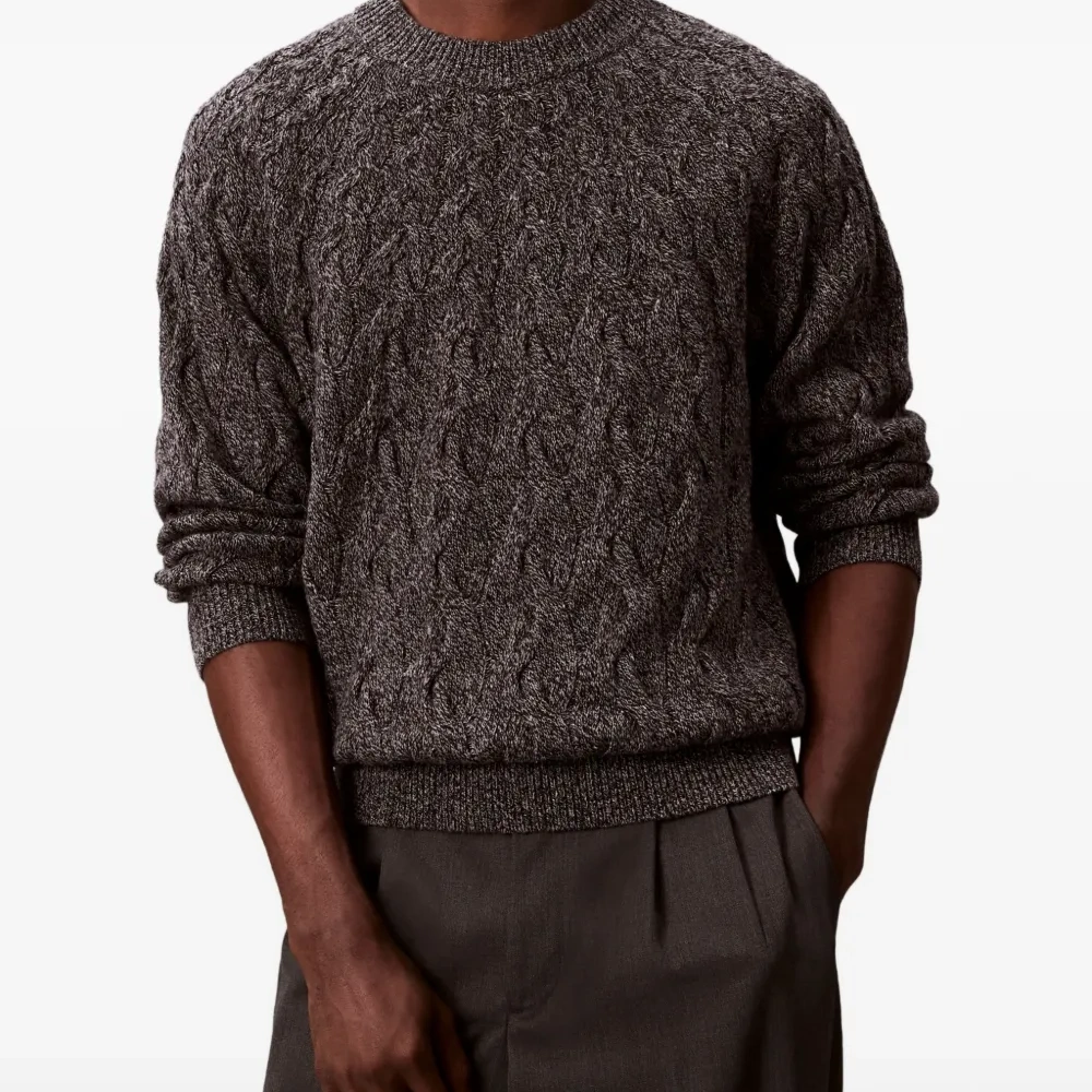 Свитер с косичками