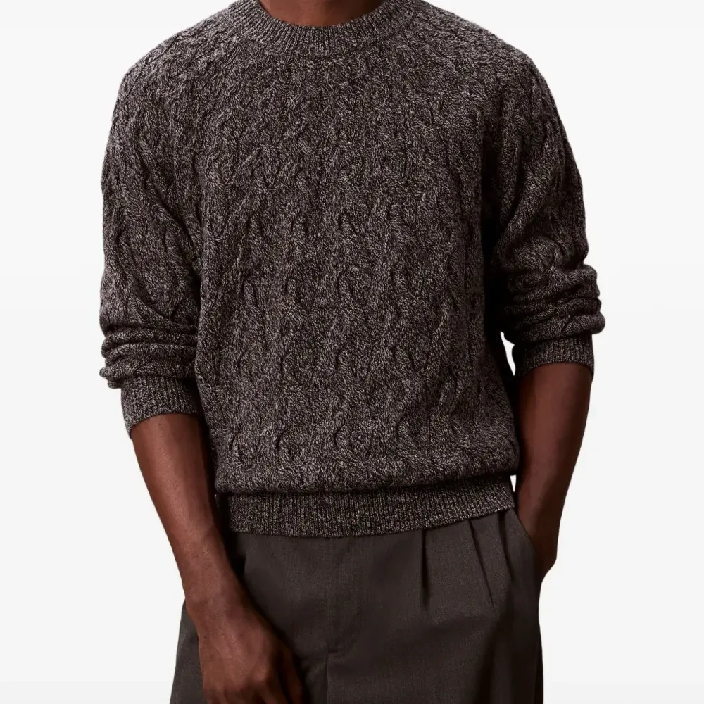 Свитер с косичками