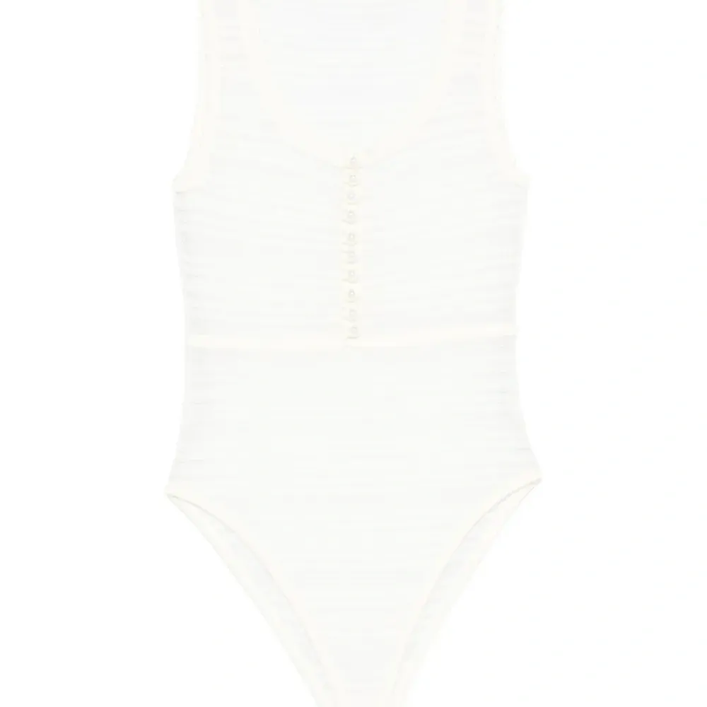 Трикотажное боди с декоративными пуговицами