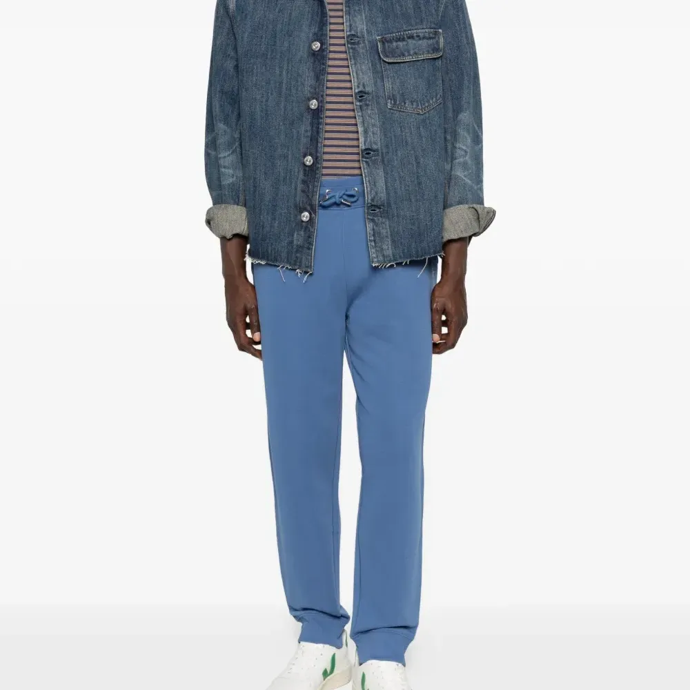 Синие спортивные брюки