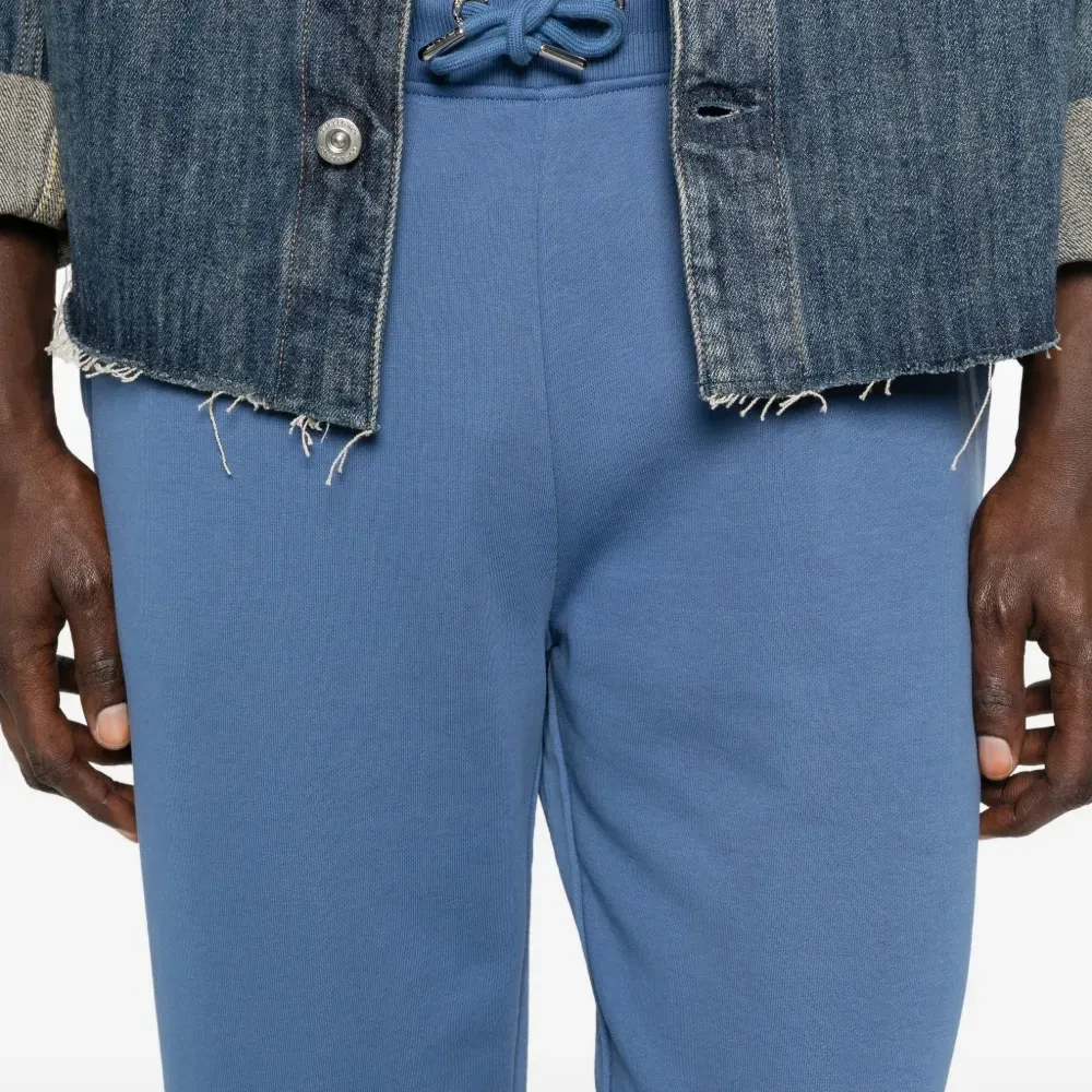 Синие спортивные брюки