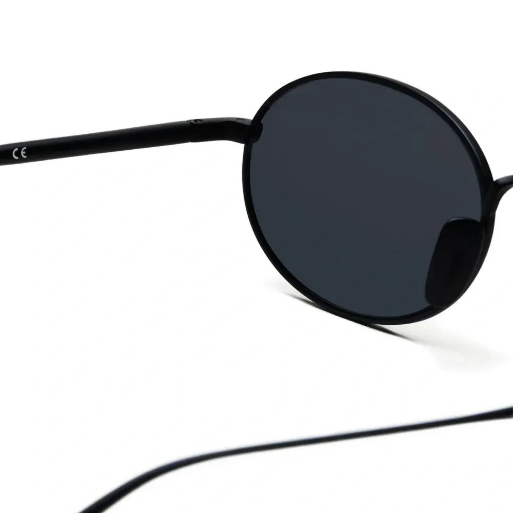 Овальные солнцезащитные очки Titan