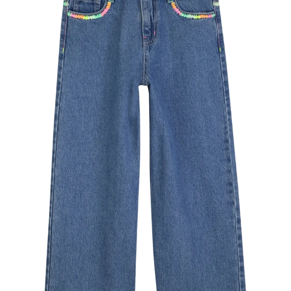 Джинсы с вышивкой