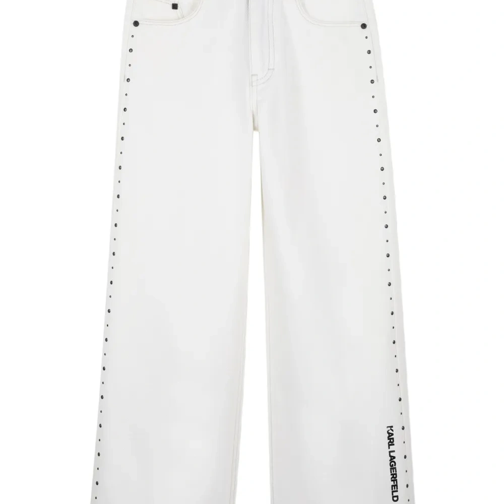 Брюки с заклепками