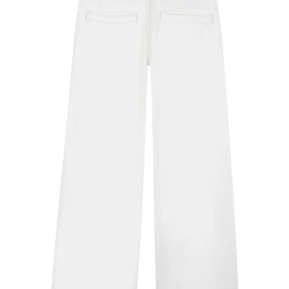 Брюки с заклепками