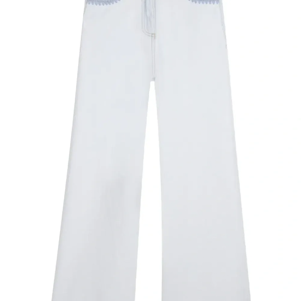 Брюки с карманами Брюки с карманами