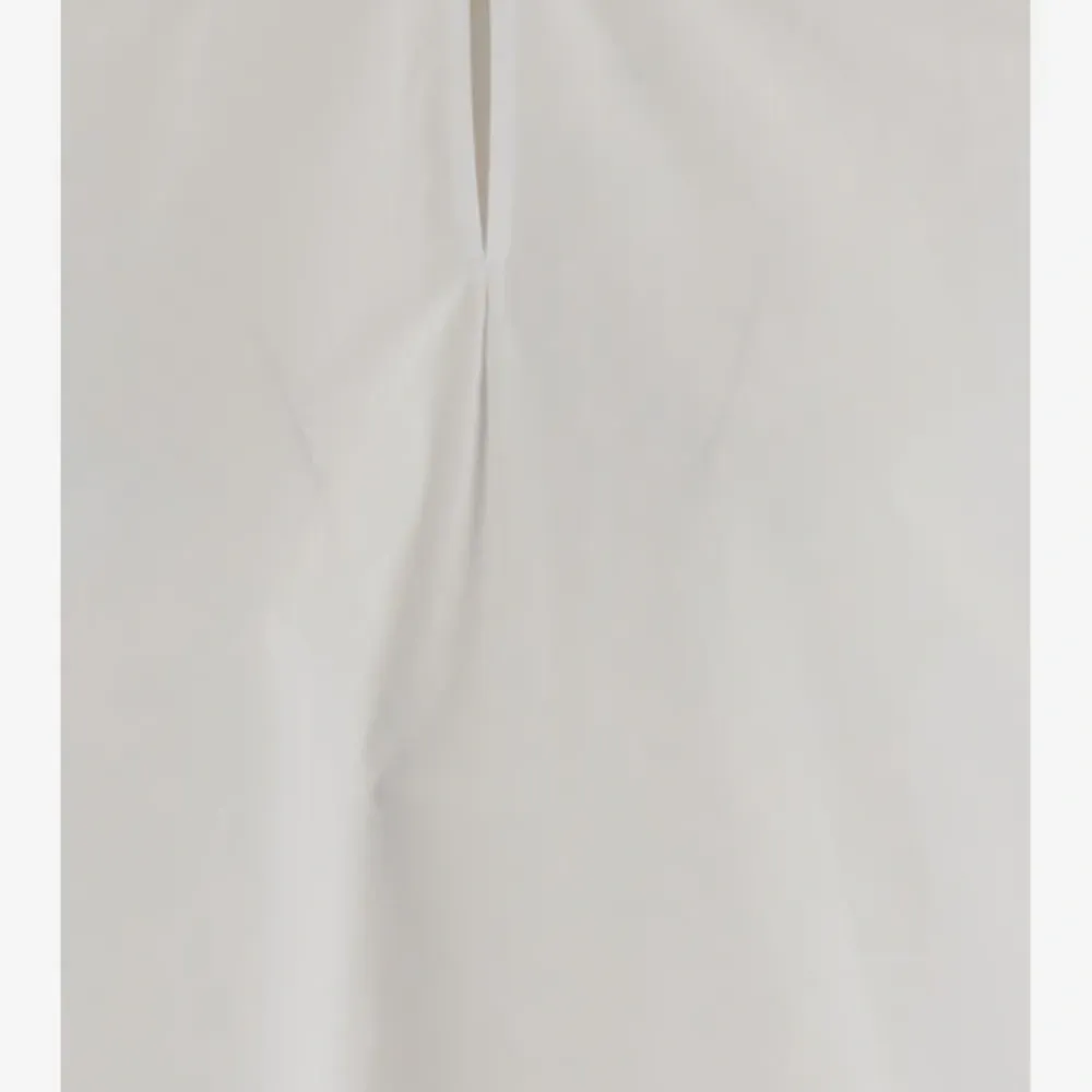 Блузка Leonora с V-образным вырезом